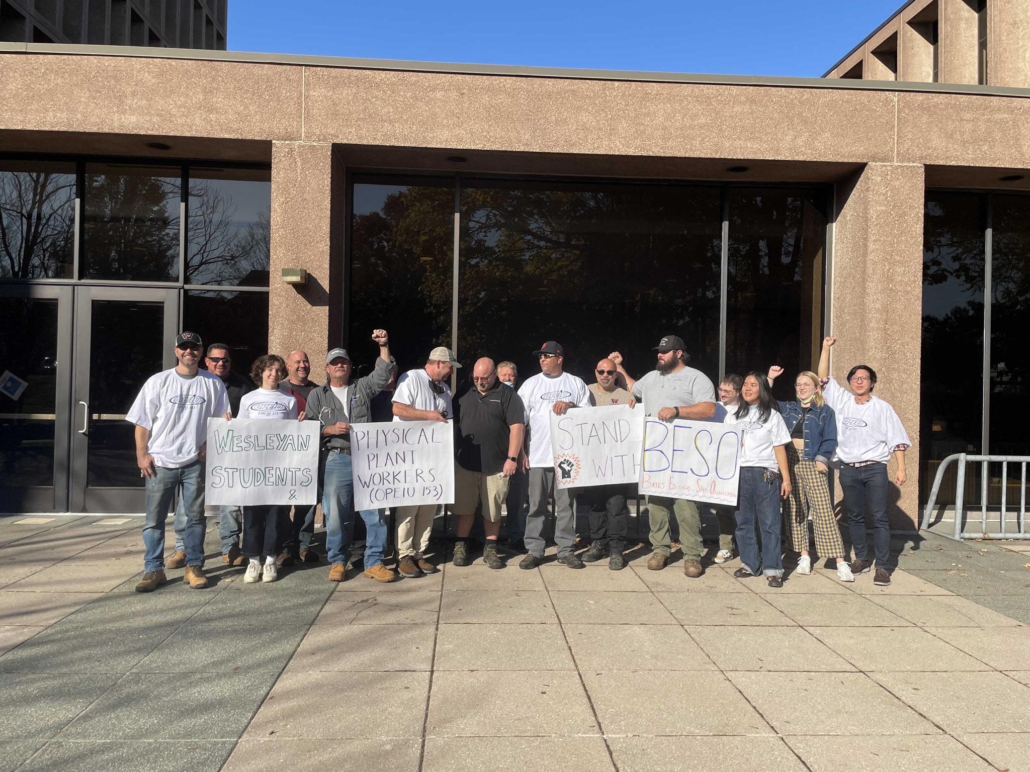 Physical Plant Workers and Wesleyan Students holding signs in solidarity with Bates workers